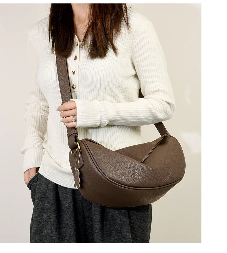 Sac banane polyvalent pour femme, style chic bandoulière, en cuir, parfait pour voyage.