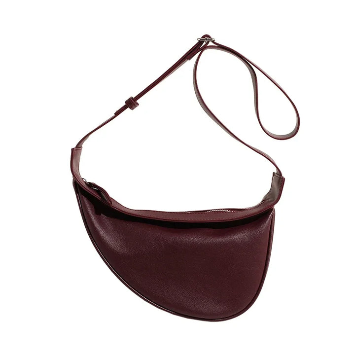 Élégant sac banane femme en cuir PU bordeaux, accessoire mode versatile et pratique.