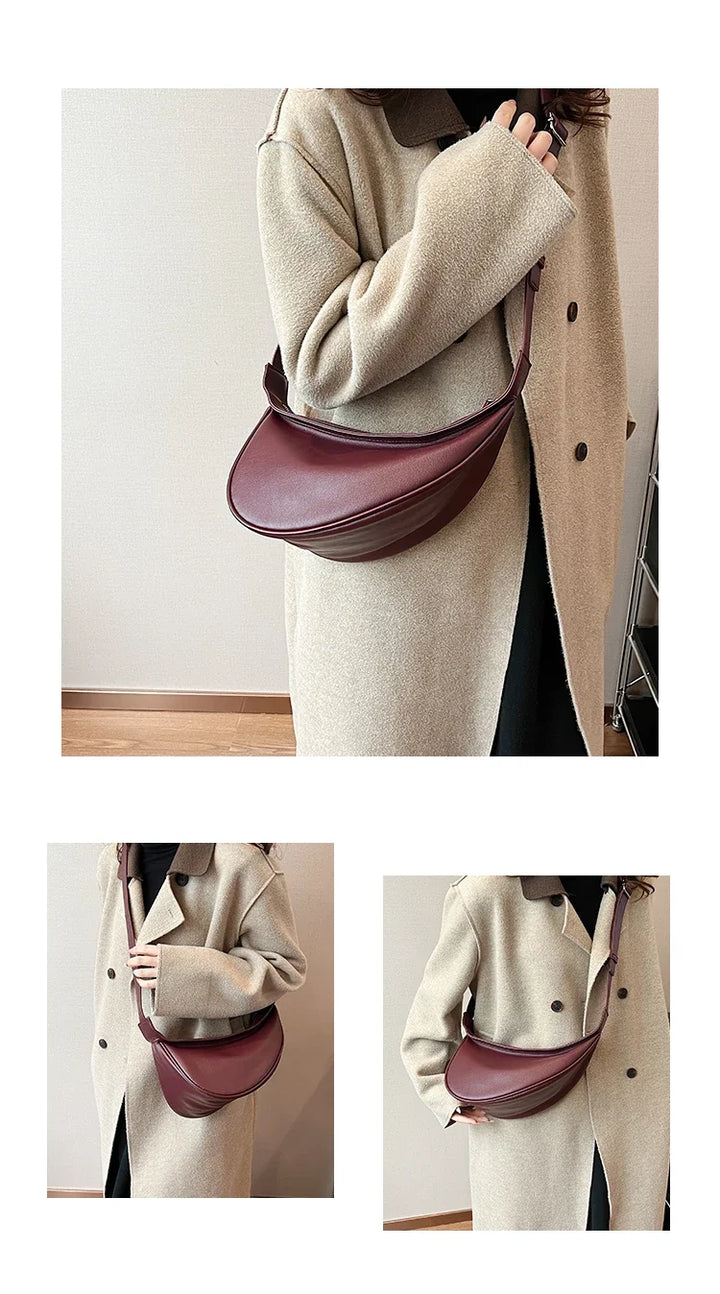 Sac banane femme noir, design compact et élégant, idéal pour un porté épaule décontracté.