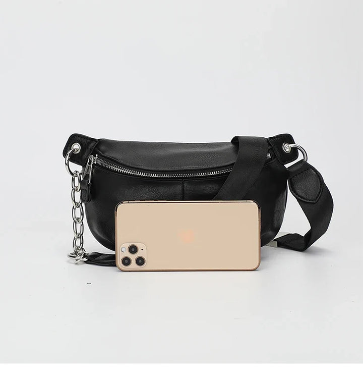 Sac banane urbain chic pour femme en similicuir noir. Un accessoire mode essentiel et tendance.