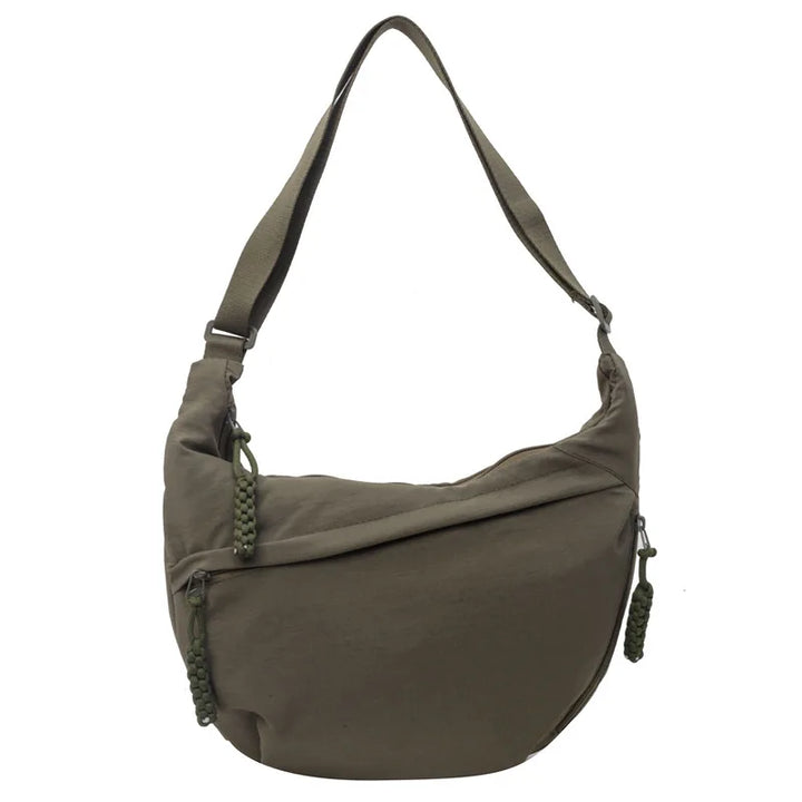 Sac banane stylé pour femme, surdimensionné, idéal pour transporter vos affaires en confort.