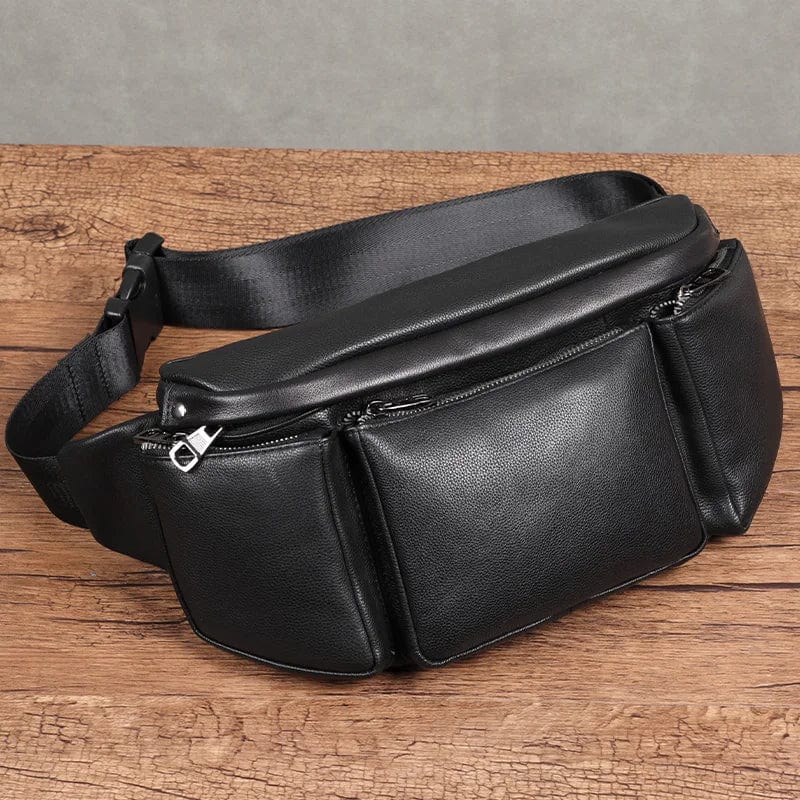 Sac banane homme en cuir véntiable noir, pour look urbain et élégant. Pratique pour voyage.