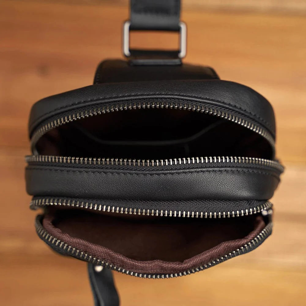 Sac banane homme porté à la taille, en cuir noir, parfait pour les voyages