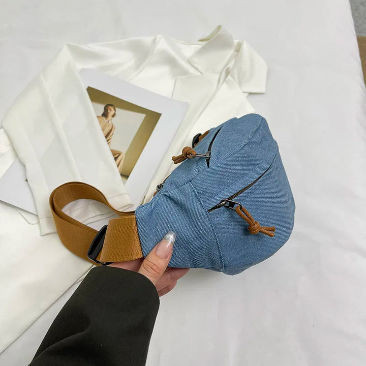 Sac banane urbain unisexe en jean, design rétro, très pratique avec ses nombreuses poches.