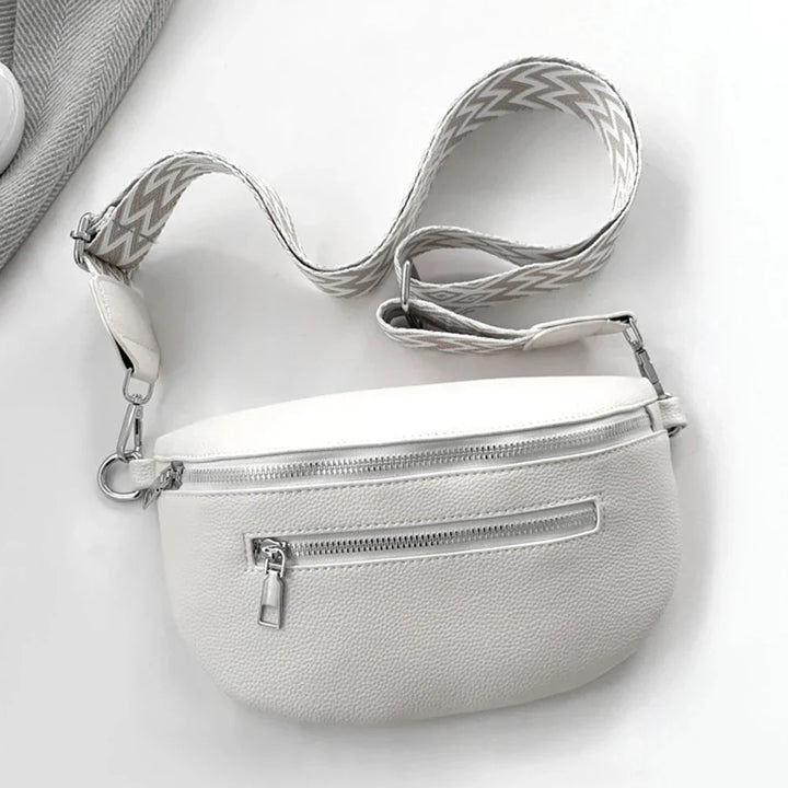 Sac banane femme gris en cuir PU, un 'sac bandoulière' compact, parfait pour transporter l'essentiel avec style.