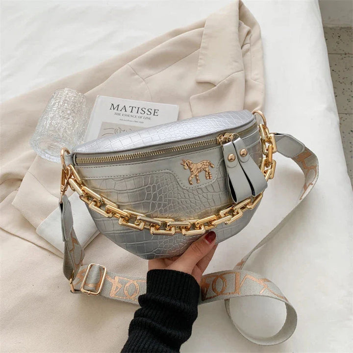 Sac banane mode pour femme, en cuir PU de qualité, agrémenté d'une chaîne dorée raffinée.