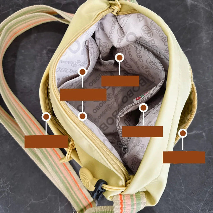 Sac banane noir, détails dorés, léger et antivol, pour femmes, look sophistiqué en voyage