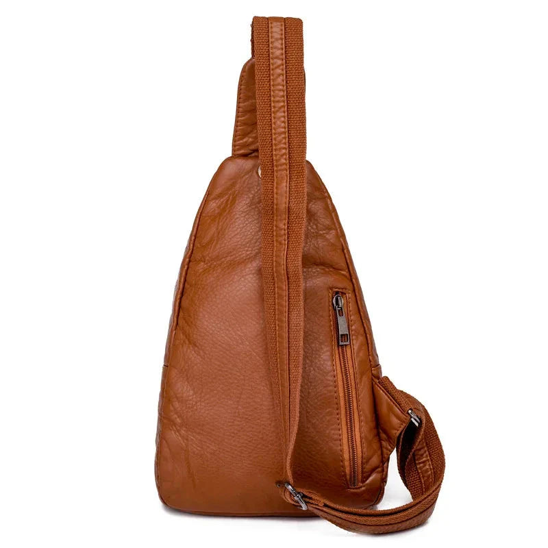 Plusieurs sacs bananes rétro en cuir PU (camel, rouge, noir) alignés, gamme couleurs pour femme.