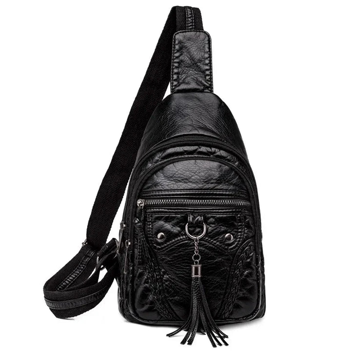 Sac banane noir en cuir PU pour femme, design rétro, idéal pour un look tendance et pratique.