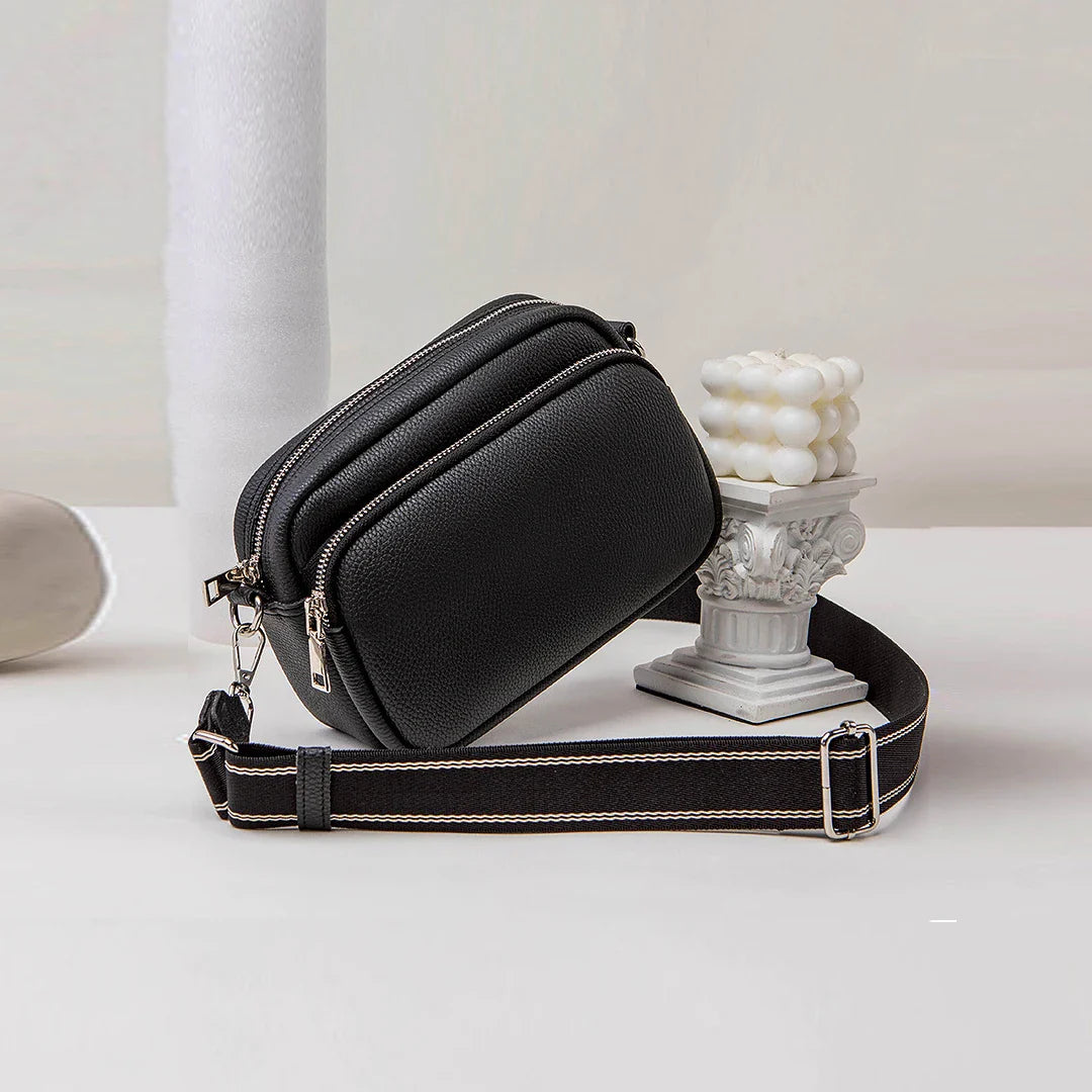 Sac banane femme rectangulaire taupe, à bandoulière, idéal pour une tenue chic et un porté confortable.