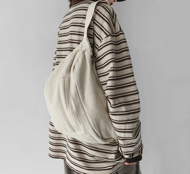 Sac banane tendance en tissu pour femme, stylé et très pratique pour toutes occasions.