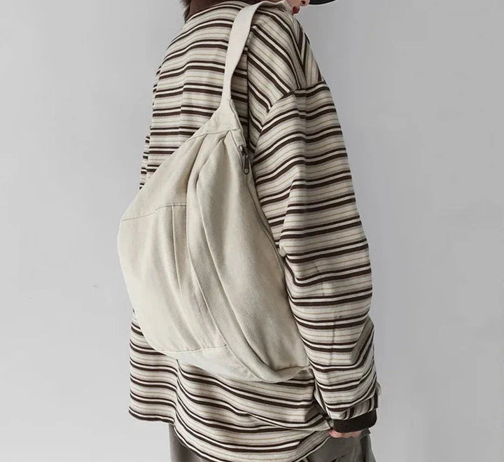 Sac banane tendance en tissu pour femme, stylé et très pratique pour toutes occasions.