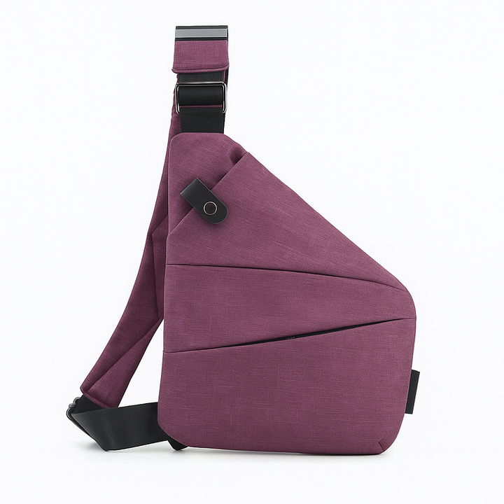 Texture du tissu étanche du sac à bandoulière, protégeant son contenu de la pluie et de l'humidité.