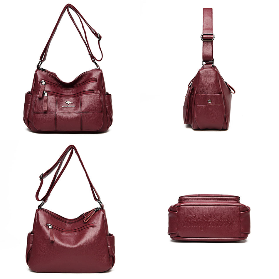 Sac bandoulière femme élégant bordeaux, texture similicuir, un accessoire mode polyvalent et pratique.