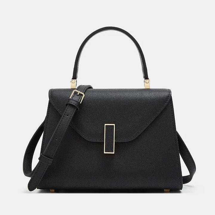 Intérieur du sac à bandoulière Catalina, avec compartiments pratiques, en cuir synthétique durable.