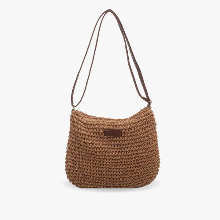 Sac de plage ou ville, paille et cuir végan, style estival chic pour femme.