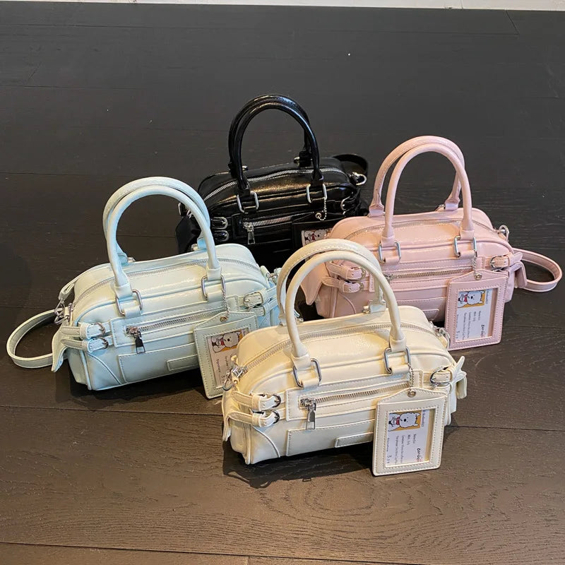 Sac à main bandoulière rose élégant, similicuir, accessoire mode femme pratique et chic pour le quotidien.