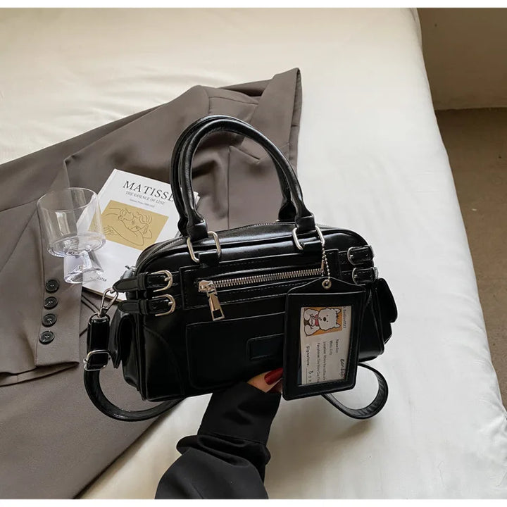 Sac bandoulière femme noir, similicuir chic, petit sac à main mode pratique pour le quotidien.