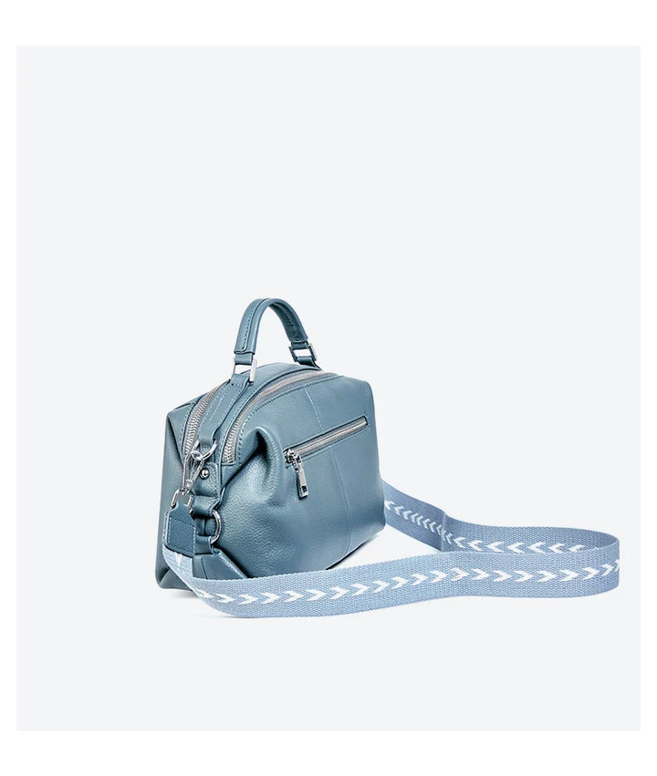 Sac bandoulière femme en cuir avec organisation intelligente, allie style et praticité.