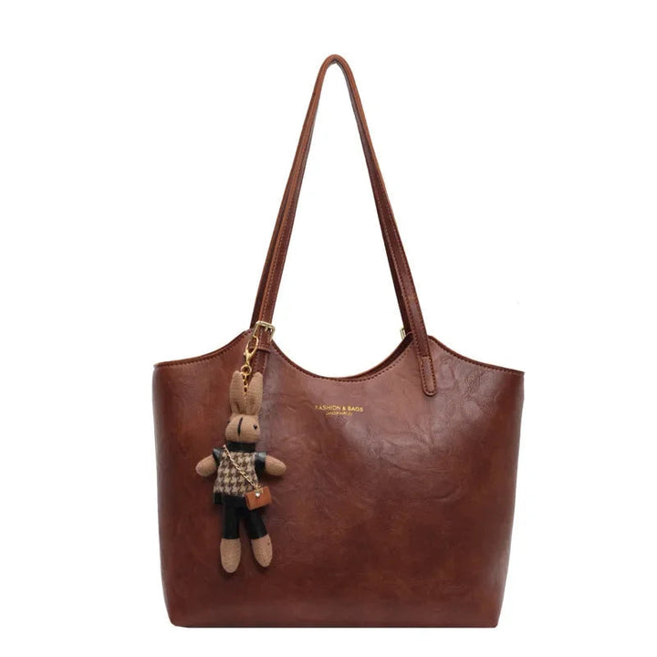 Sac à bandoulière en cuir pour femme, élégant et polyvalent, idéal pour le quotidien.