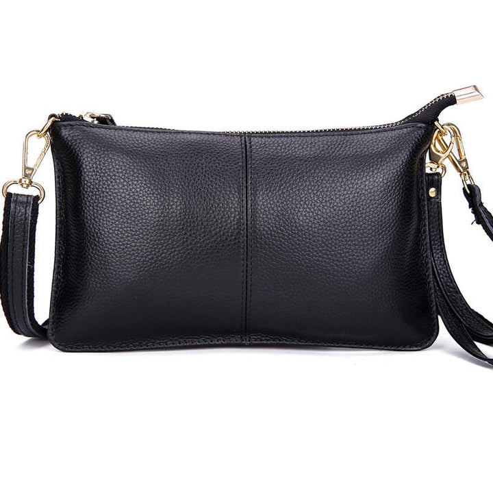 Sac bandoulière femme en cuir grainé noir, élégant et chic, parfait pour le quotidien. Accessoire de mode durable.