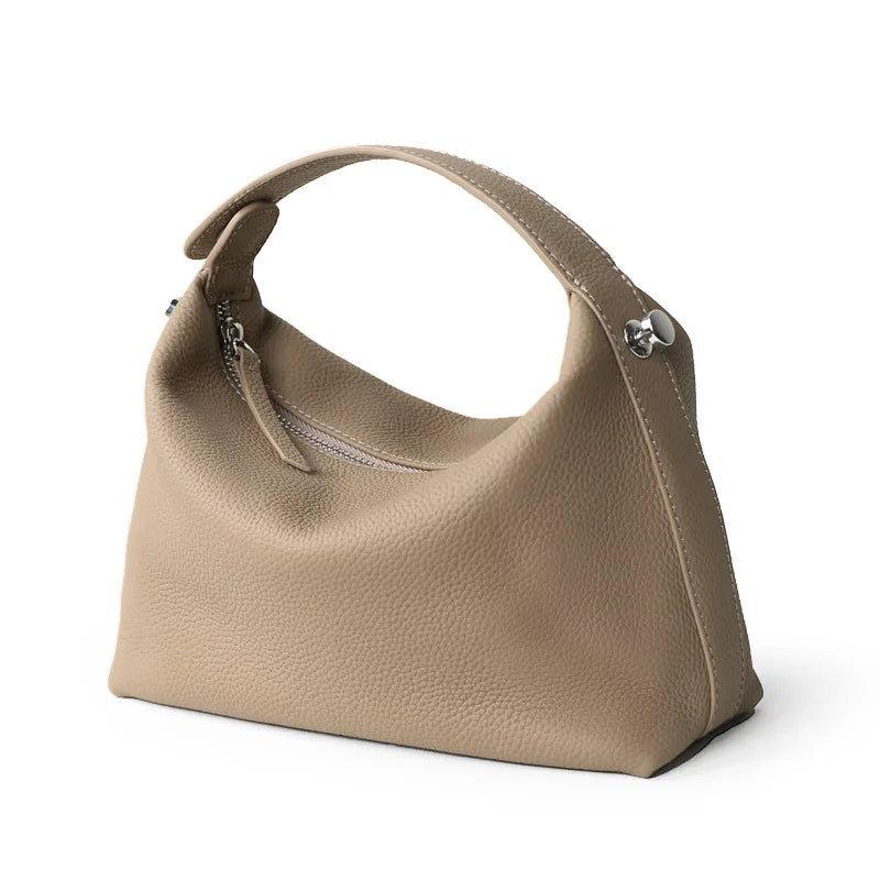 Sac élégant en cuir pour femme, bandoulière fine, accessoire mode de haute qualité et durable.