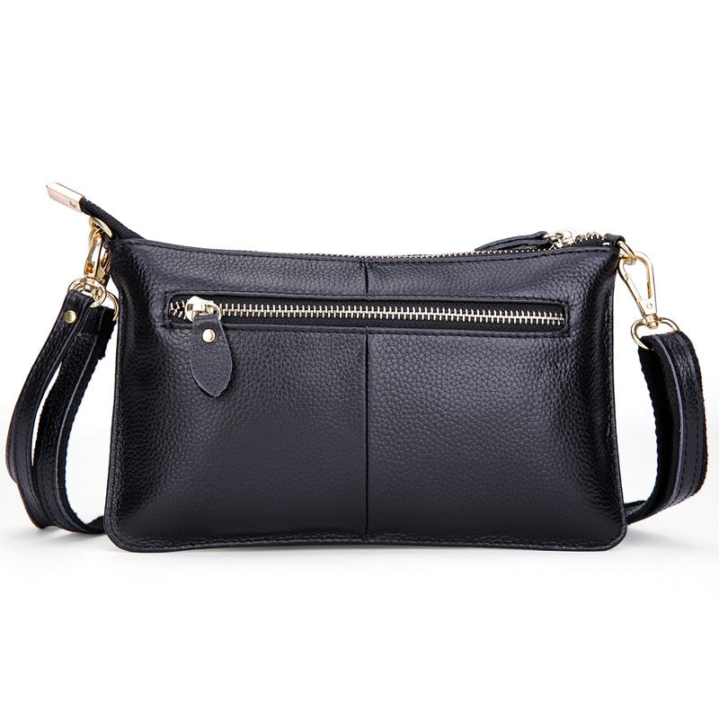 Élégant sac femme noir en cuir grainé, un accessoire de mode durable pour un usage quotidien chic et pratique.