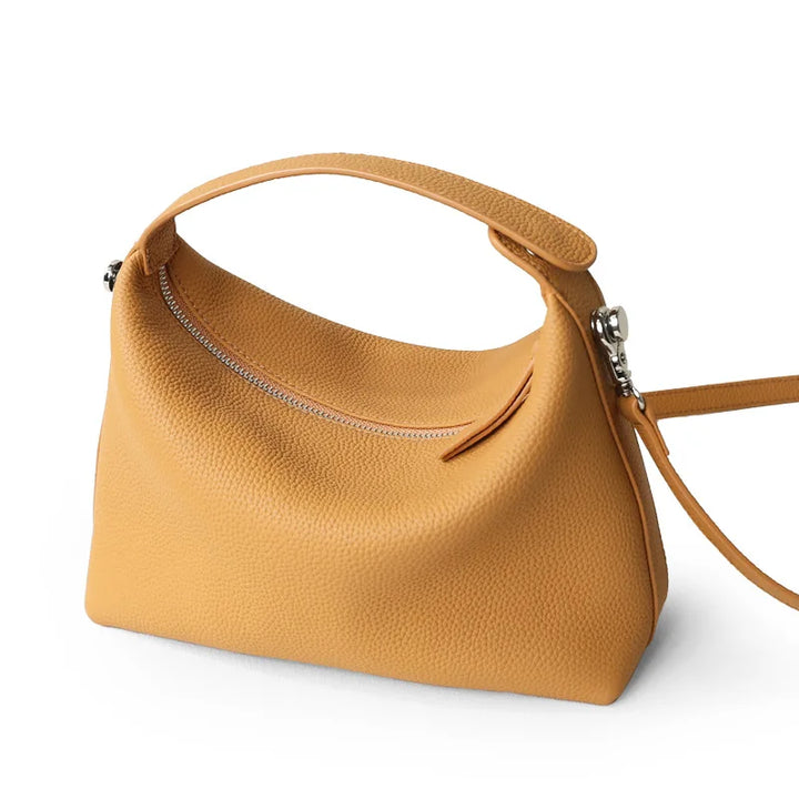 Sac bandoulière élégant pour femme, en cuir véritable, un accessoire de mode intemporel.