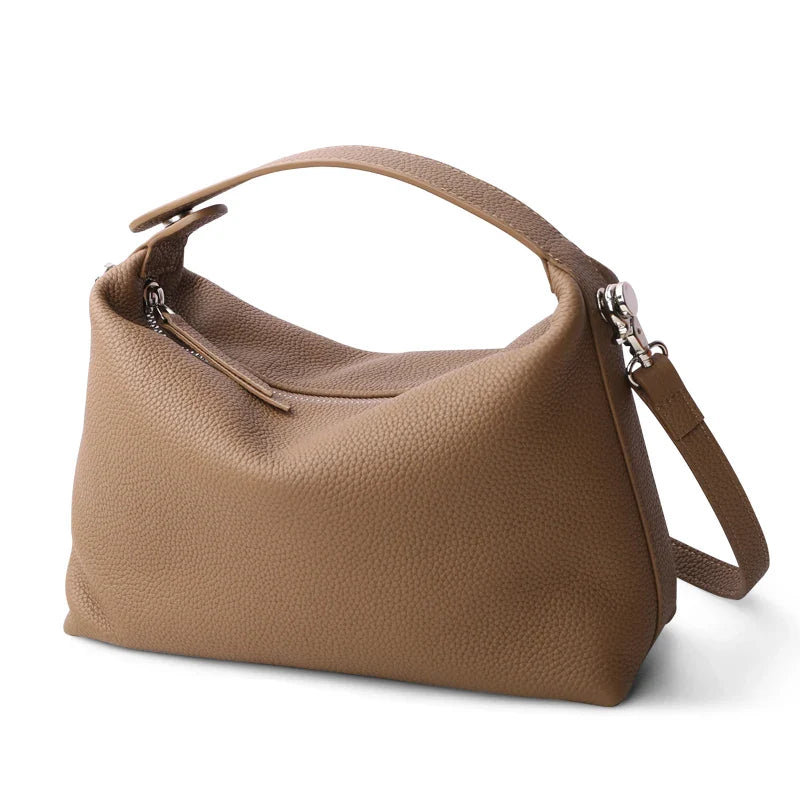 Sac à main femme en cuir grainé, style bandoulière, compact, pratique et très stylé.