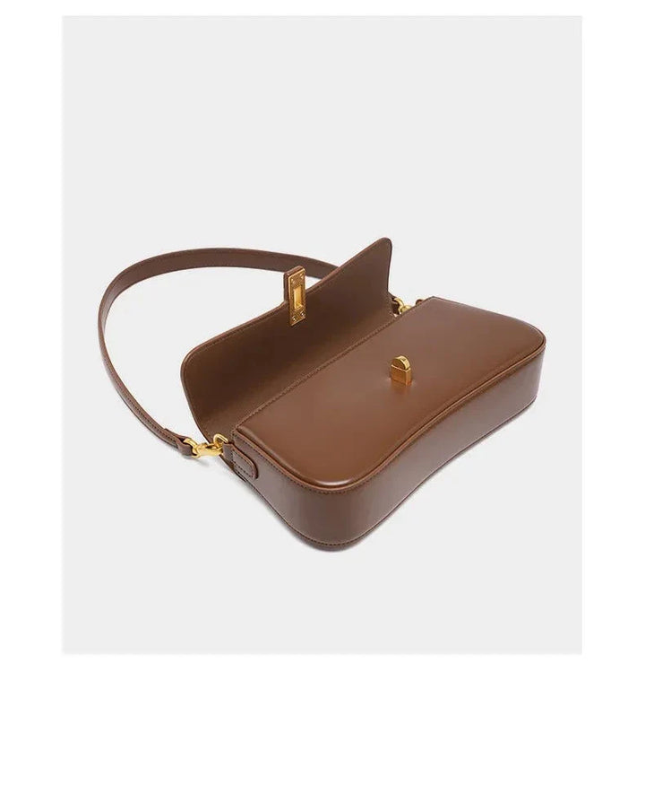 Sac à main femme en cuir marron, design élégant avec bandoulière, idéal pour le style quotidien.