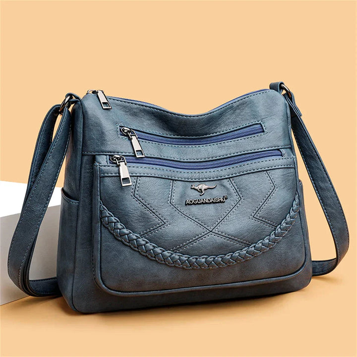 Sac bandoulière femme en cuir souple, style chic et élégant pour usage quotidien.