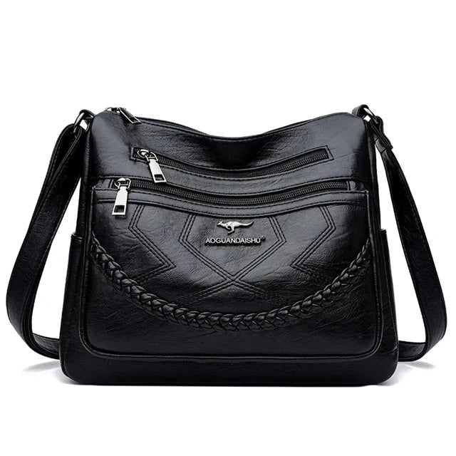 Sac bandoulière élégant femme, accessoire mode en cuir souple, confort et style quotidien.