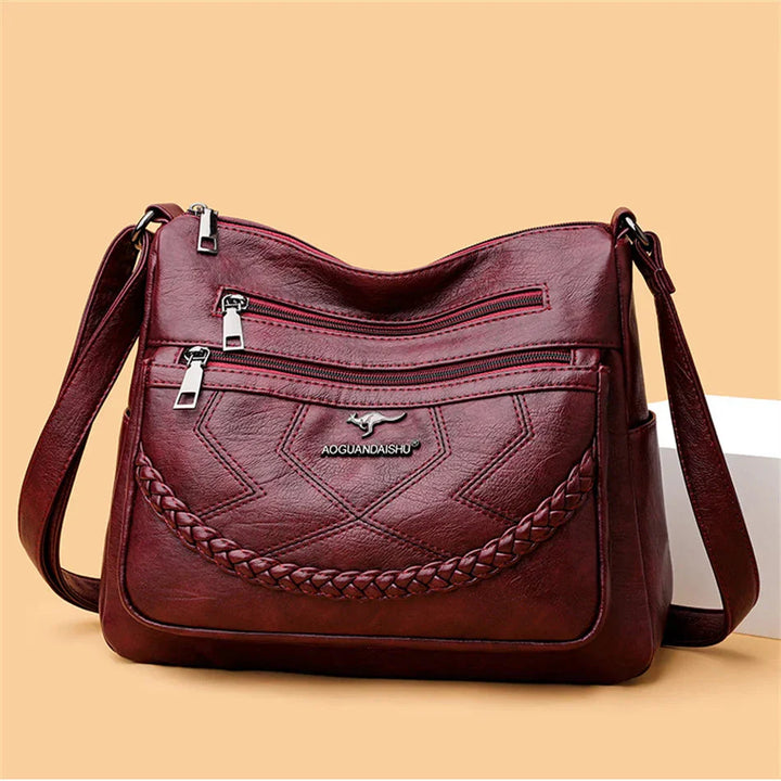 Sac à main femme chic en cuir souple avec bandoulière réglable, parfait pour le quotidien.