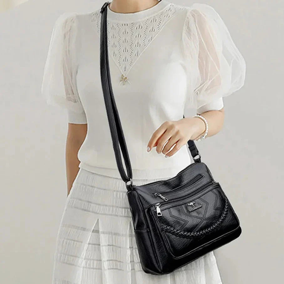 Élégant sac bandoulière femme, grand confort et organisation, accessoire mode indispensable.