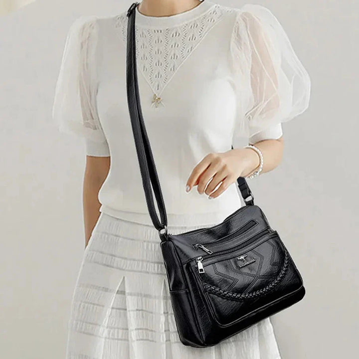 Élégant sac bandoulière femme, grand confort et organisation, accessoire mode indispensable.