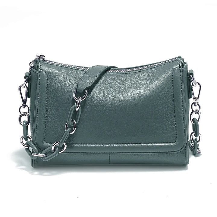 Sac bandoulière polyvalent pour femme en cuir végétalien, couleur taupe, design moderne.