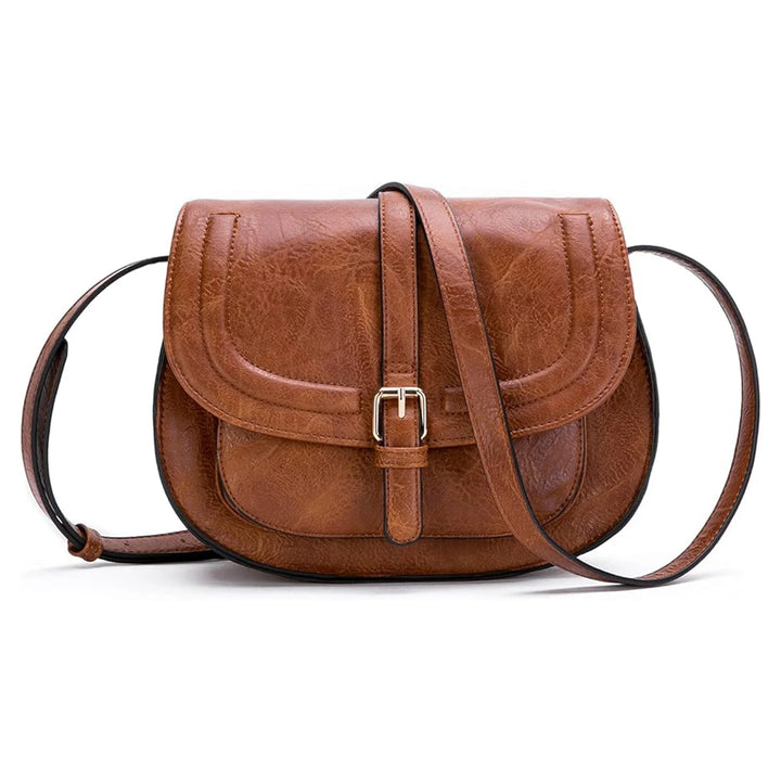 Sac à rabat chic en similicuir pour femme, accessoire mode tendance, porté épaule.