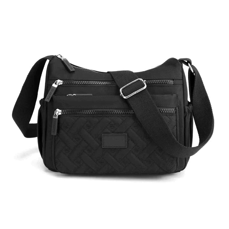 Sac à main femme léger et confortable, avec bandoulière réglable. Chic et polyvalent pour tout look.