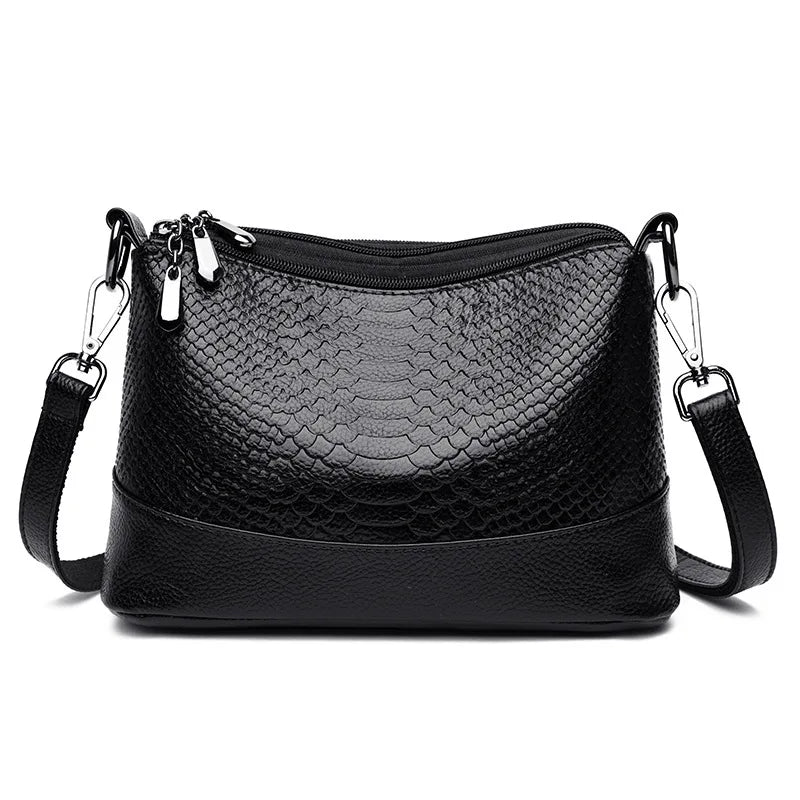Sac bandoulière femme élégant effet crocodile, en simili cuir noir, chic et pratique.