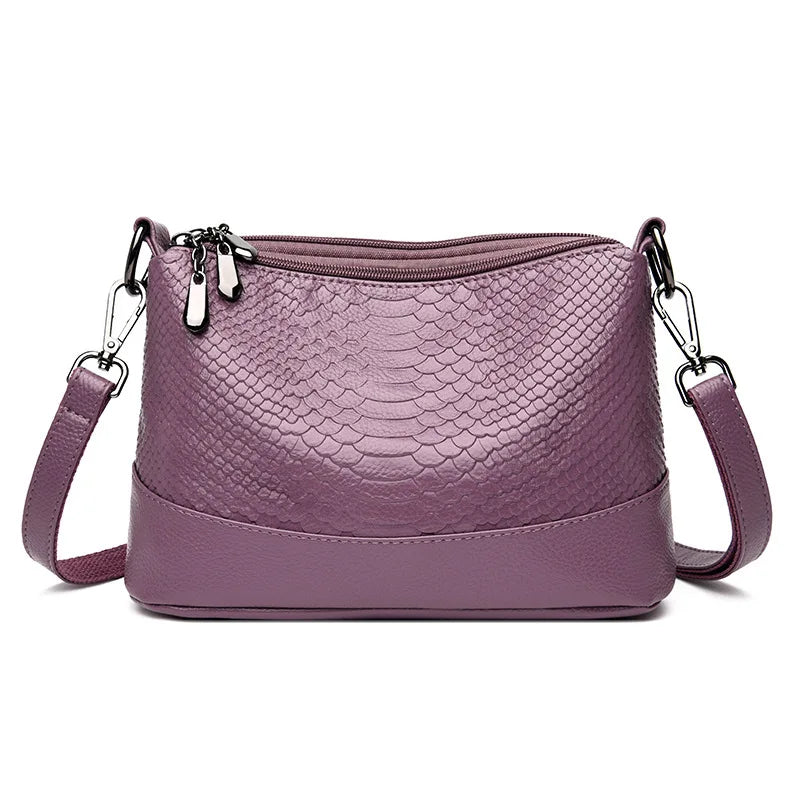 Sac femme mode avec bandoulière réglable, texture crocodile, idéal pour toutes occasions.