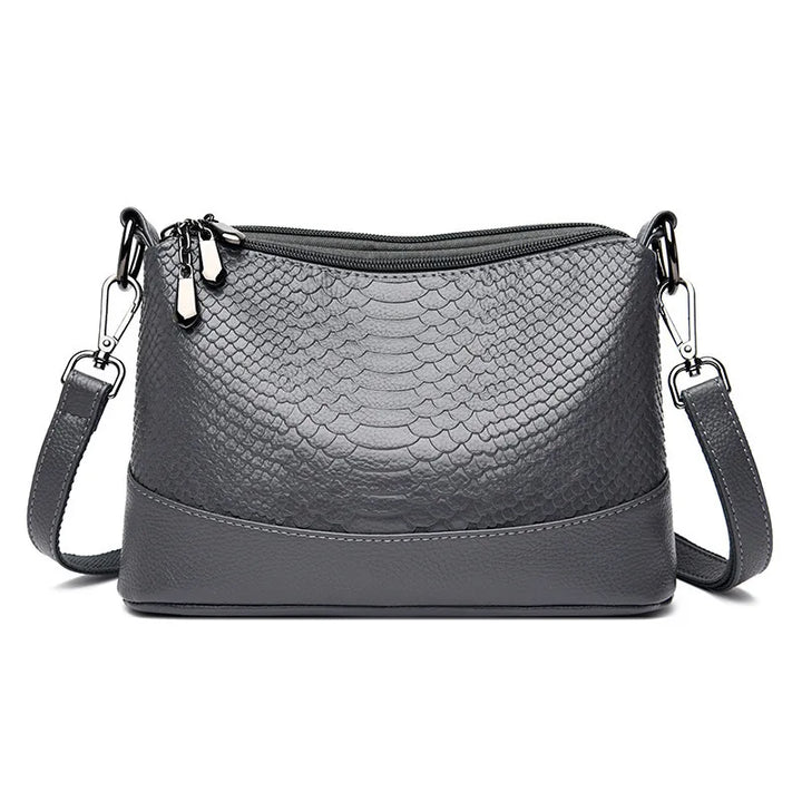 Sac élégant femme à bandoulière, motif crocodile, parfait pour un look sophistiqué et chic.
