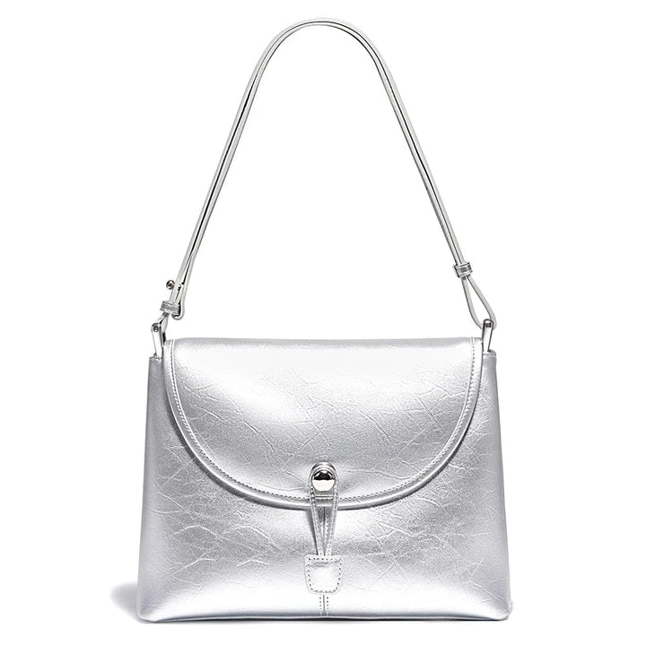 Sac à main en cuir abricot, pratique et élégant pour femme avec quincaillerie argentée