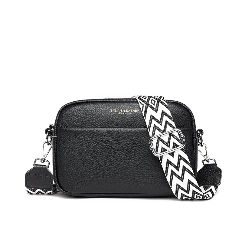 Sac bandoulière femme élégant en cuir noir, parfait pour un usage quotidien.