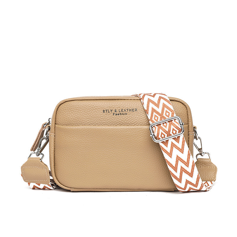 Sac bandoulière femme élégant et fonctionnel en cuir, compact pour organiser vos essentiels.