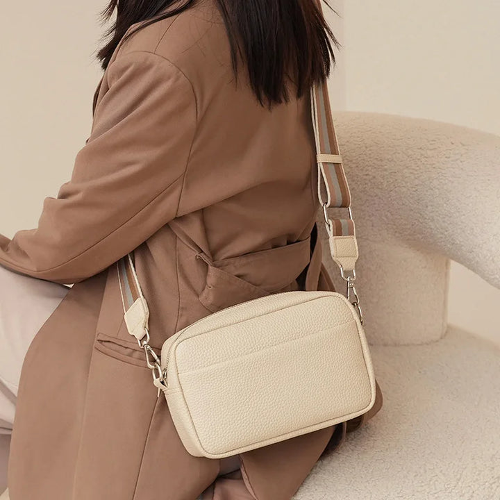 Sac bandoulière femme élégant en cuir PU avec large sangle réglable, idéal pour un style moderne.