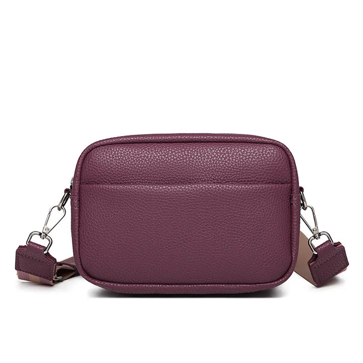 Sac bandoulière femme raffiné, en cuir PU, doté d'une sangle large réglable pour un style intemporel.