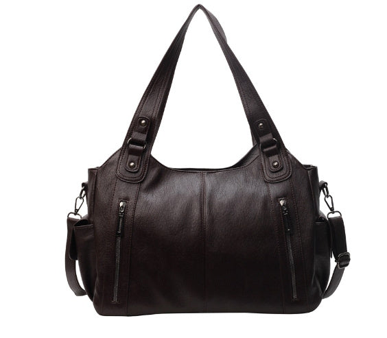 Sac bandoulière femme tendance en cuir synthétique, avec bandoulière réglable pour un style chic.