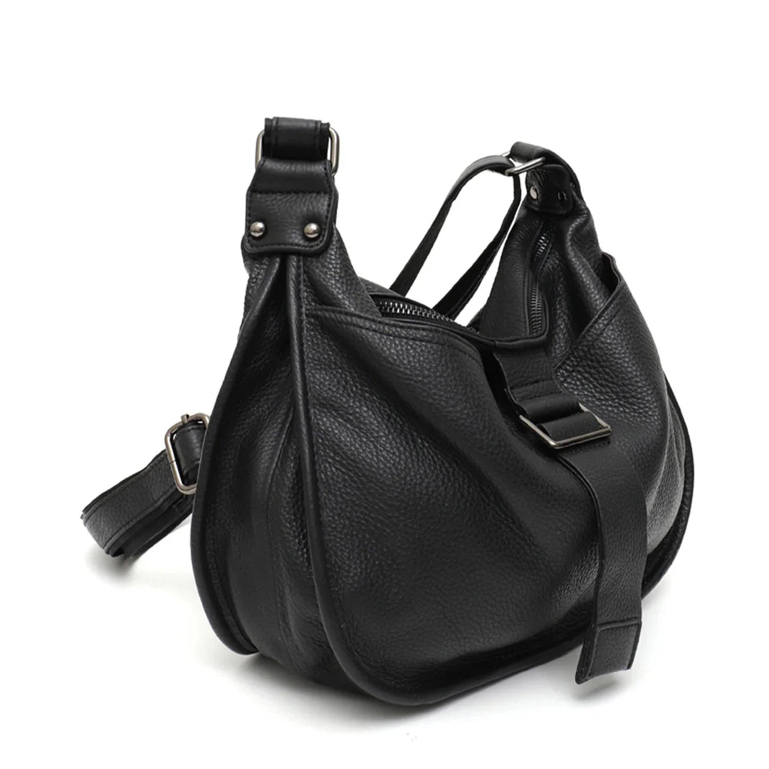 Sac bandoulière femme élégant en similicuir noir grand format, parfait pour un usage quotidien chic et pratique.