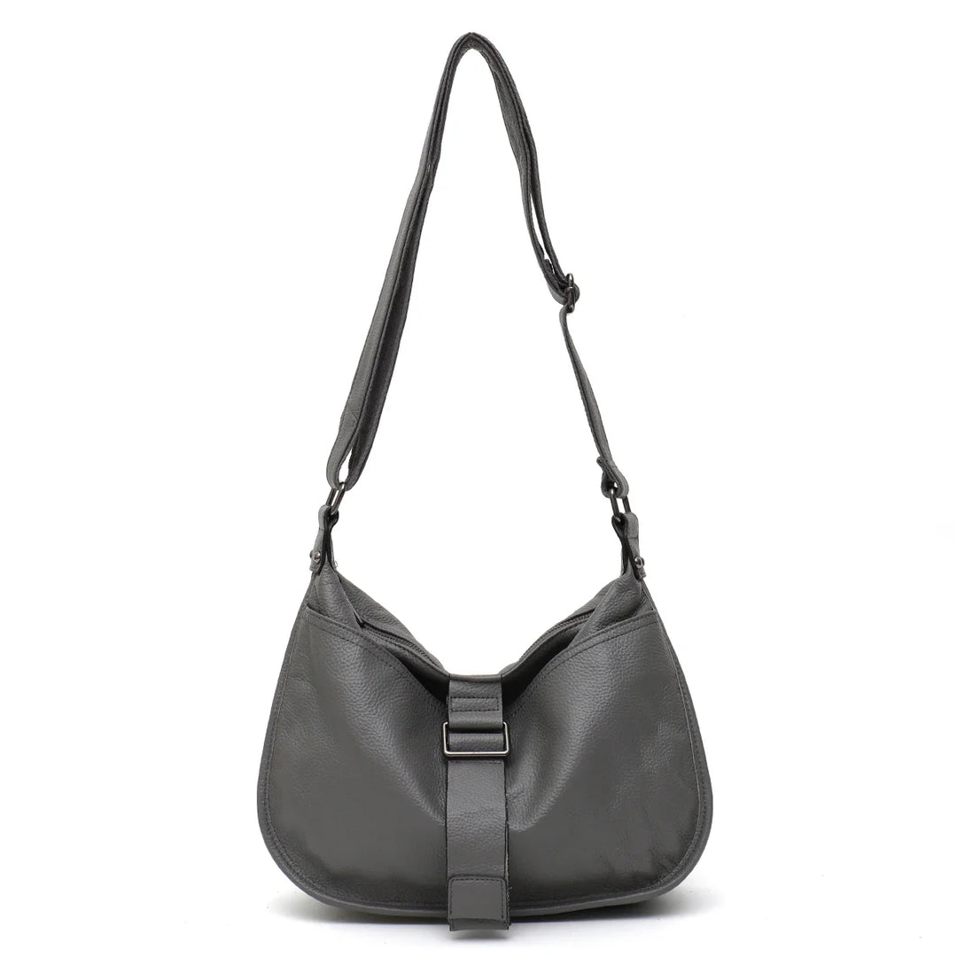 Sac bandoulière tendance pour femme en similicuir vert foncé, grand format, accessoire chic au quotidien.
