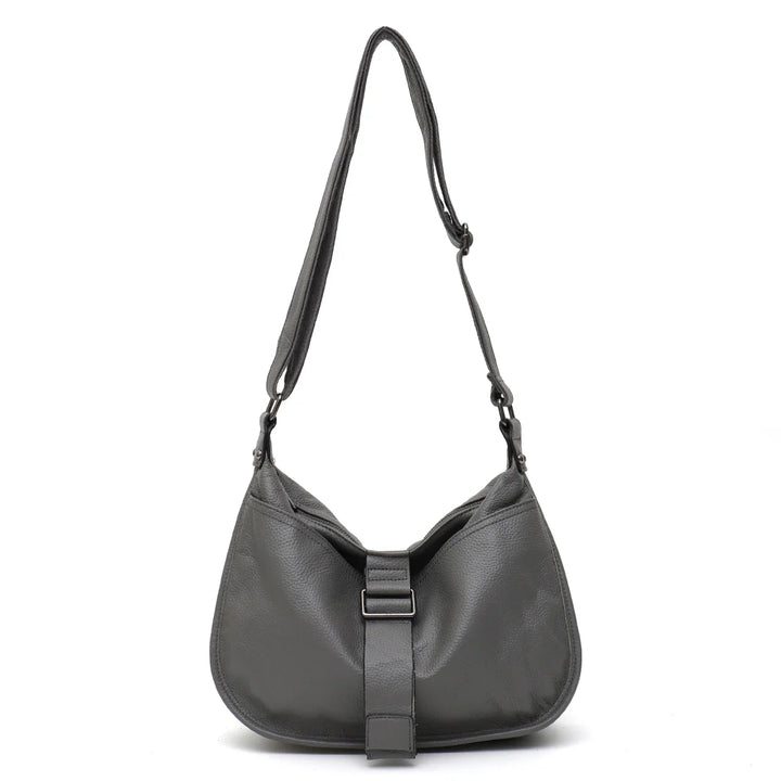 Sac bandoulière tendance pour femme en similicuir vert foncé, grand format, accessoire chic au quotidien.